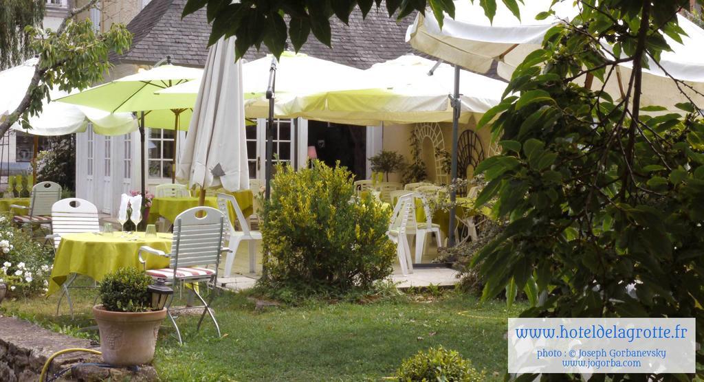 Hotel De La Grotte Монтиньяк Экстерьер фото